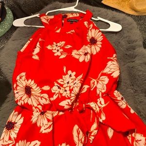 Floral shorts romper, perfect for a hot summer night on the town.